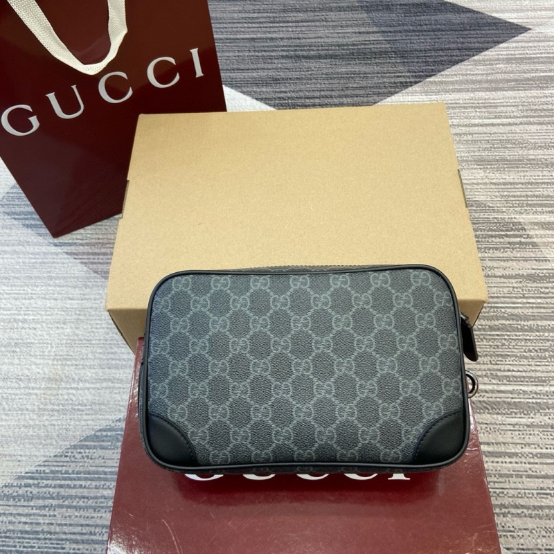 G*u*i clutch bags